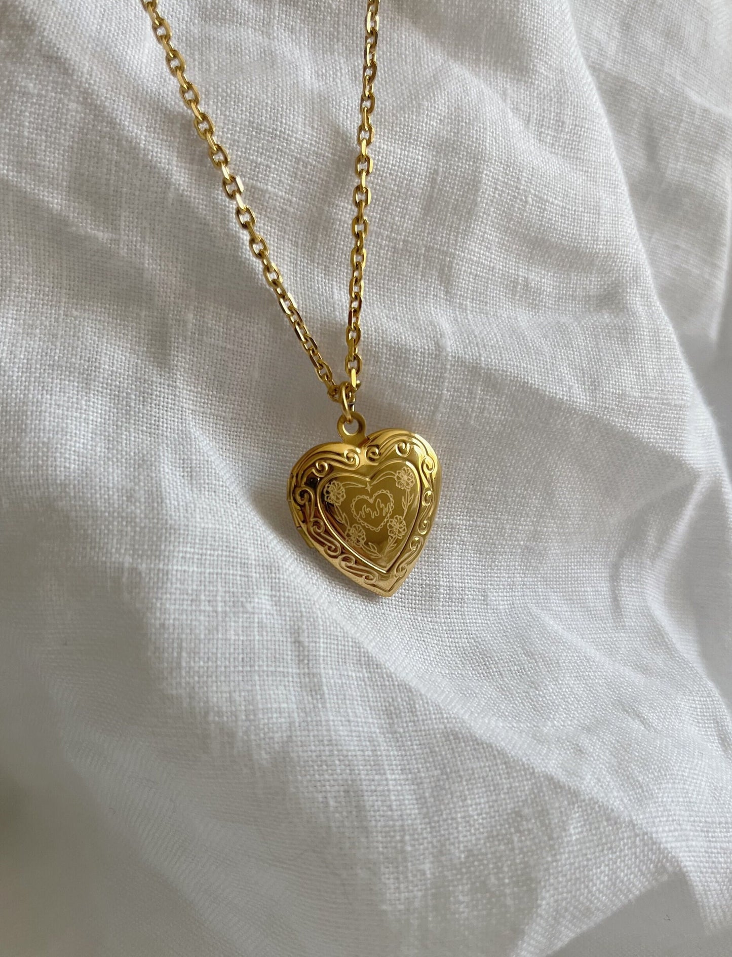 Gold Fireheart Locket Necklace